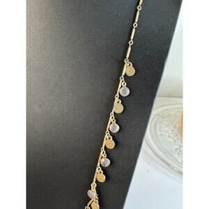 Gold toned necklace with dangle cha cha by Canvas. 35” + 3” ext